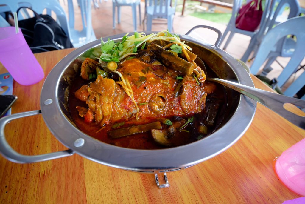 "Experience Authentic Malaysian Flavors with the Fish Head Curry at Tugu View Cafe, Kuala Lumpur"